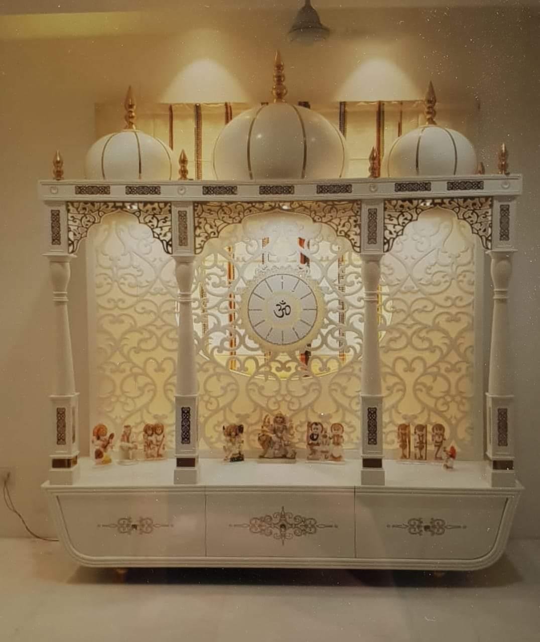 Illuminated Om design in a custom mandir