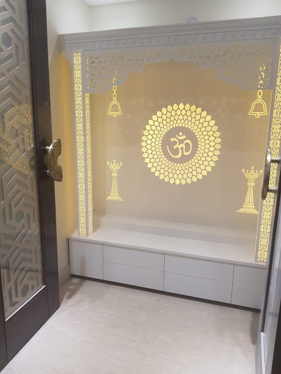 White custom mandir with carved details